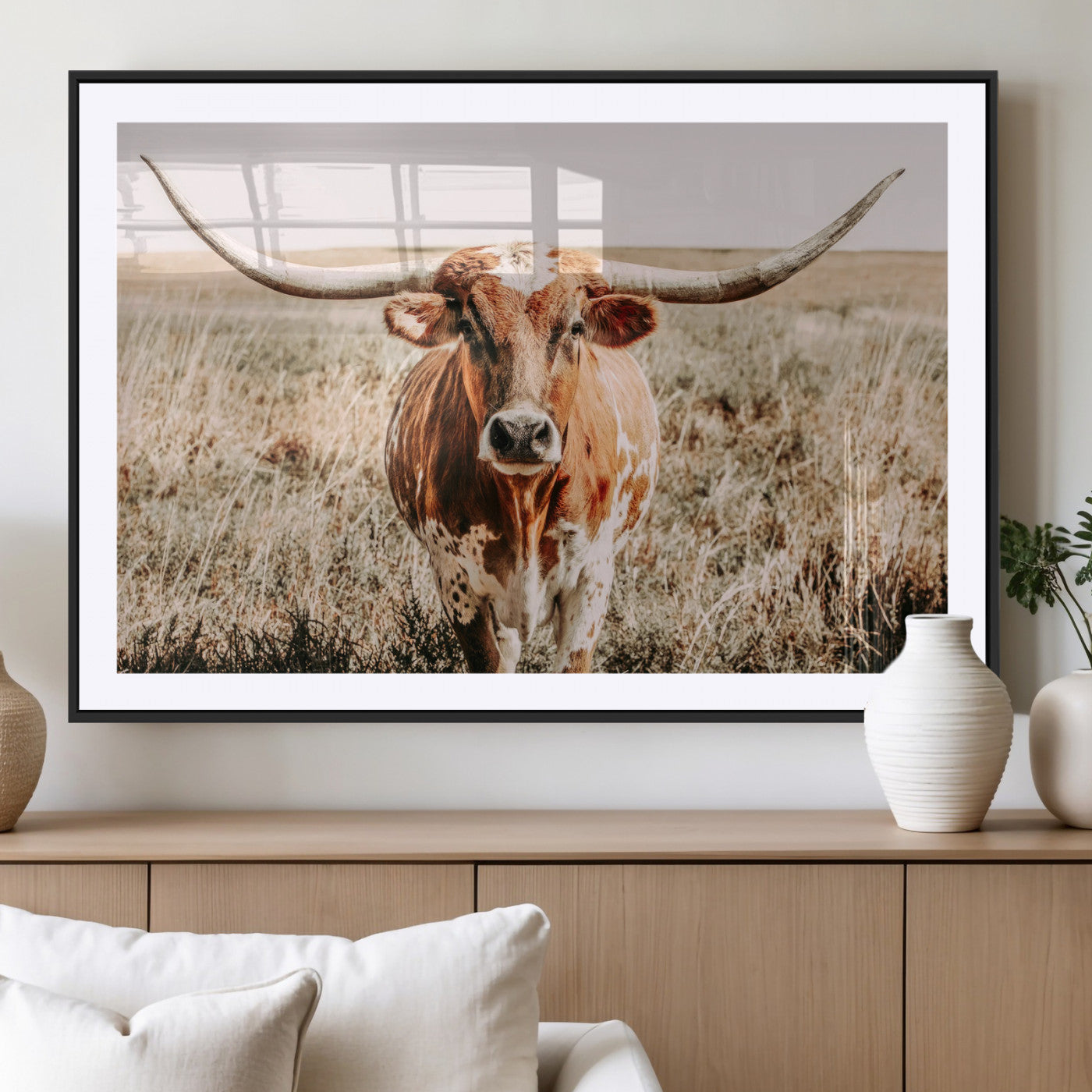 Framed longhorn cow canvas wall art with rustic prairie background, western animal print perfect for farmhouse or ranch style decor