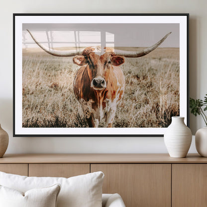 Framed longhorn cow canvas wall art with rustic prairie background, western animal print perfect for farmhouse or ranch style decor