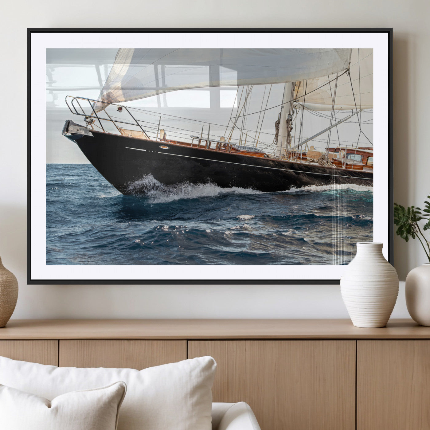 Close-up of a classic sailing yacht with wooden deck and full sails, perfect for nautical or coastal-style decor in ocean-themed spaces.