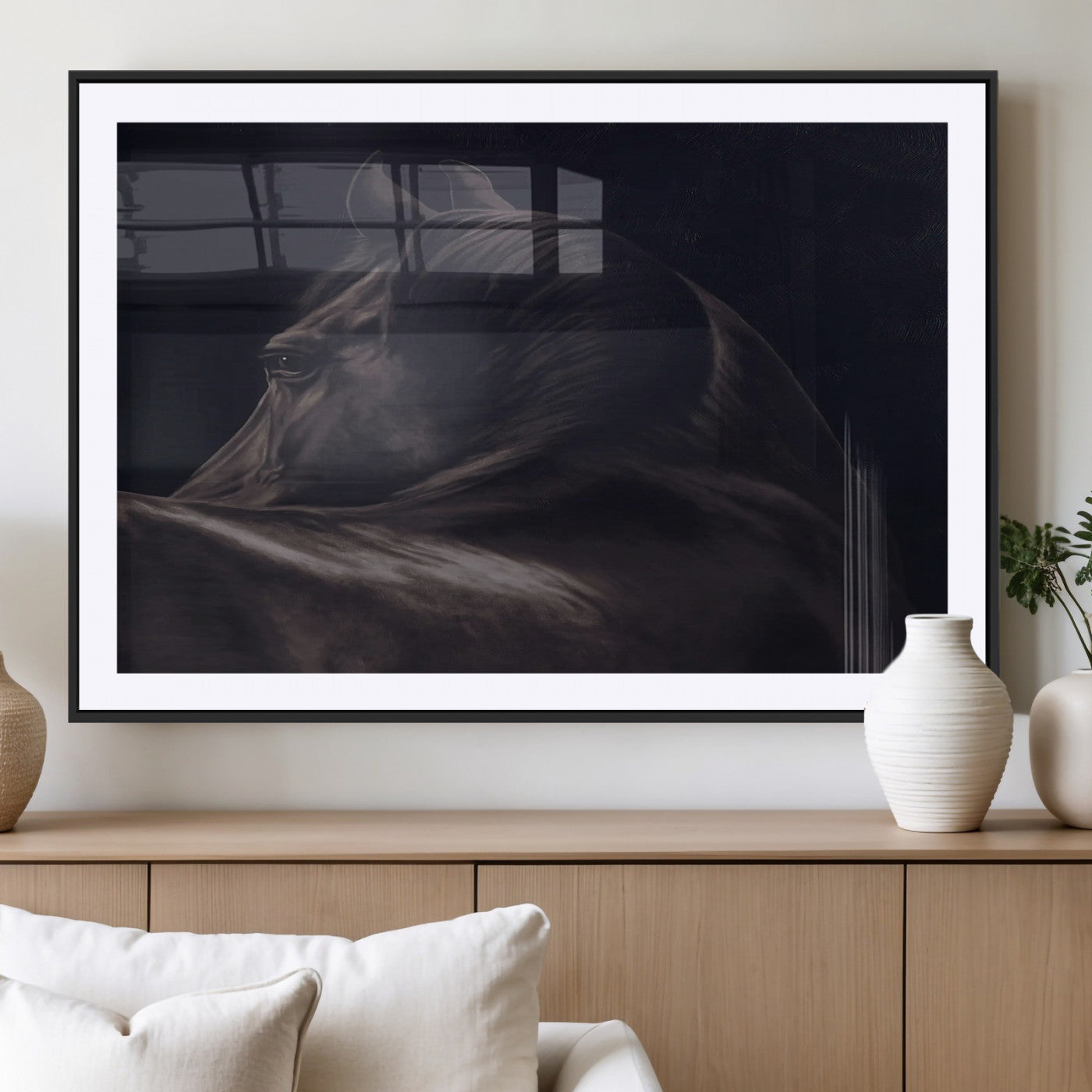 Close-up of a black horse with dramatic lighting on a dark background, perfect for rustic or masculine home decor.