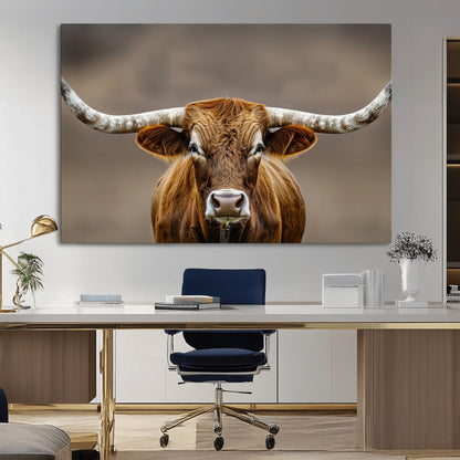 Close-up of a Texas Longhorn with strong curved horns and warm brown tones, perfect for rustic or western-style wall decor.