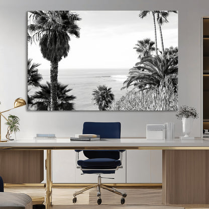 Monochrome canvas of palm trees framing a coastal surf scene, perfect for California-inspired or retro black-and-white beach decor.