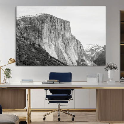 Monochrome canvas of El Capitan’s granite wall in Yosemite with snowy peaks, ideal for dramatic mountain or black-and-white nature decor.
