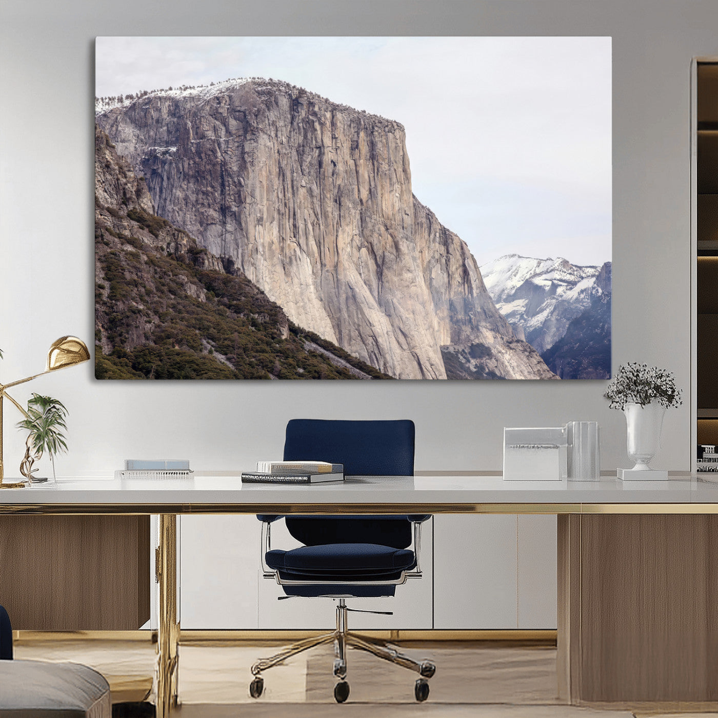 Framed canvas of El Capitan’s vertical granite face in Yosemite with snowy peaks, ideal for Sierra minimalism or mountain-inspired decor.