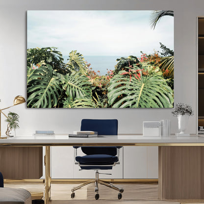Monstera leaves and tropical flowers framing a calm ocean view, ideal for tropical coastal or exotic jungle-style interior wall decor.