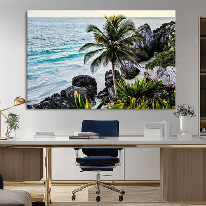 Framed canvas of a vibrant tropical coastline with palm trees, rocky cliffs, and turquoise waters, ideal for tropical coastal home decor.