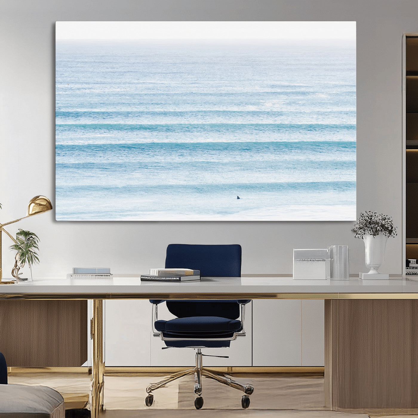 Minimalist ocean view with soft blue waves and a lone surfer, creating a serene and airy coastal aesthetic, perfect for tranquil home decor.