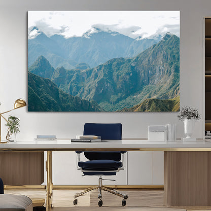 A misty mountain landscape with cloud-covered Andean peaks and lush green valleys, creating a dramatic and serene view, perfect for rustic or nature-inspired home decor.