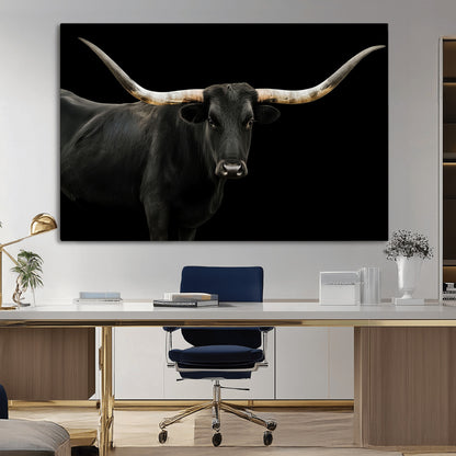 Close-up of a black Texas longhorn with large curved horns on black background, ideal for rustic farmhouse or modern western interiors.