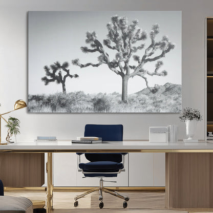 Black and white Joshua tree in a desert landscape with soft light and dry brush, perfect for rustic or minimalist home decor.