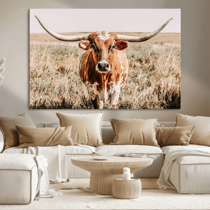 Framed longhorn cow canvas wall art with rustic prairie background, western animal print perfect for farmhouse or ranch style decor