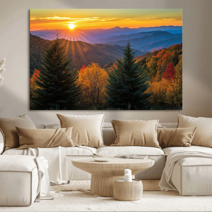 Vibrant sunset over autumn mountains with colorful trees and warm light, ideal for nature lovers or cabin-style wall decor.