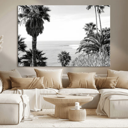 Monochrome canvas of palm trees framing a coastal surf scene, perfect for California-inspired or retro black-and-white beach decor.