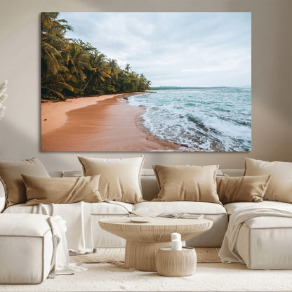 Framed canvas of a tropical beach with palm trees and soft waves, ideal for coastal escape or serene nature-inspired home decor.
