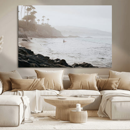 Framed canvas of a surfer in misty coastal tones at a foggy California beach, ideal for minimalist coastal beach or serene ocean-themed decor.