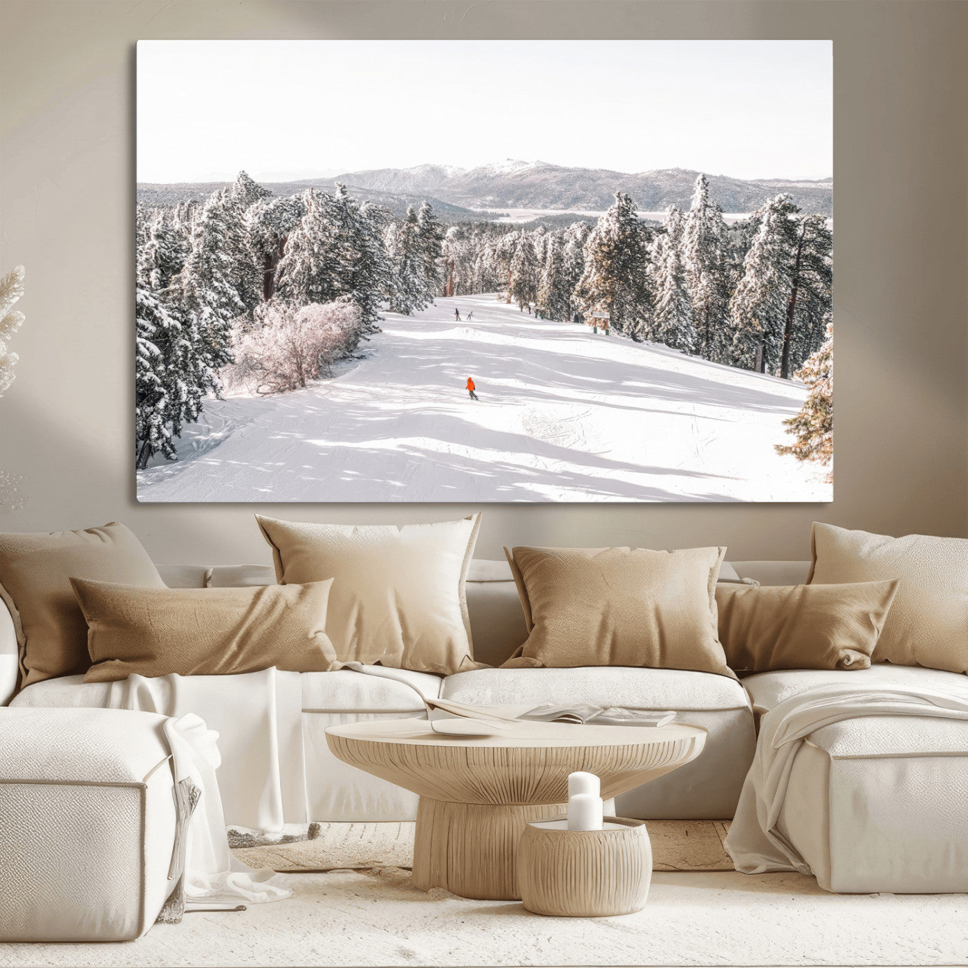 Bright ski trail lined with snow-covered pines and a skier in orange, perfect for alpine adventure or winter sports-inspired decor.