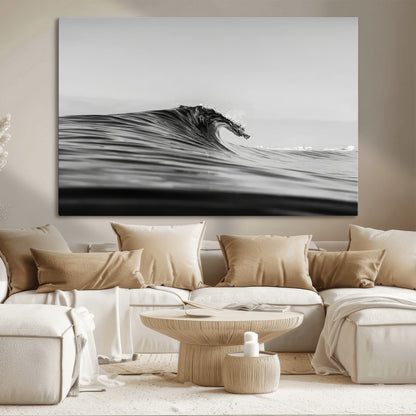 Striking black and white photo of a curling wave, ideal for modern coastal or minimalist wall decor settings.