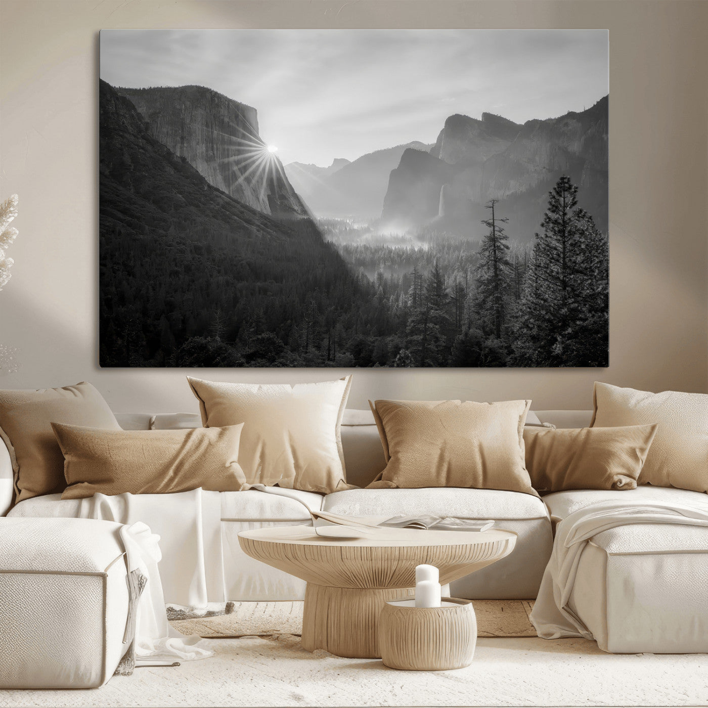 Black and white landscape of Yosemite with sun rays peeking over El Capitan, ideal for moody nature or modern rustic decor.