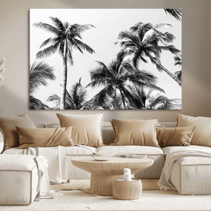 Black and white canvas of tall palm trees in moody tones, perfect for modern tropical minimalist or coastal-style home decor.