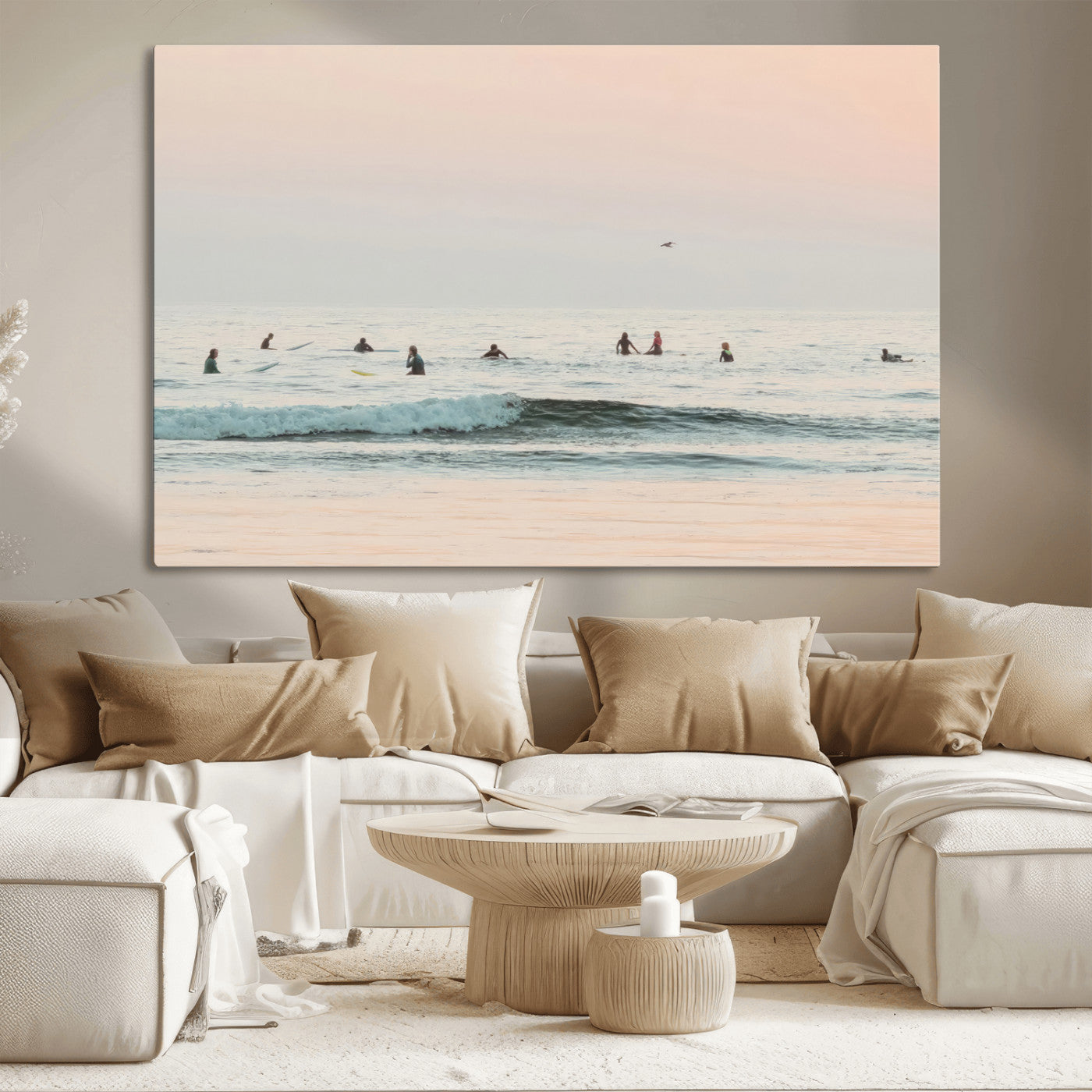 Dreamy photo of surfers waiting on soft pastel waves under a pink sunset sky, ideal for soft coastal minimalist or serene ocean-themed home decor.