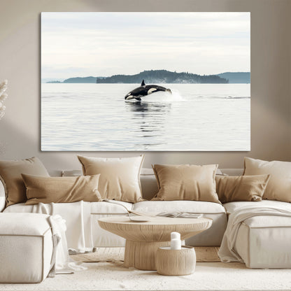 An orca jumping out of calm ocean waters with a misty island in the background, creating a serene and minimalist marine wildlife scene.