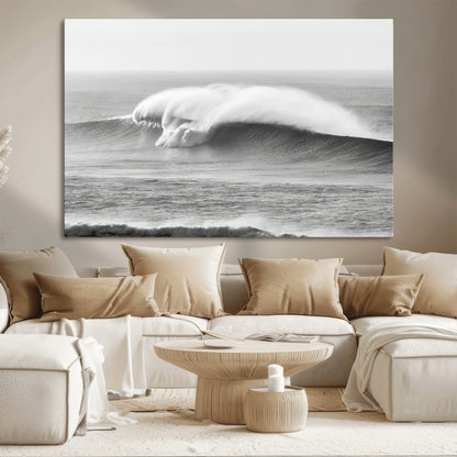 A dramatic black and white ocean wave crashing with immense force, capturing the raw power and movement of the sea in a bold seascape.