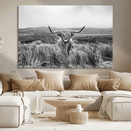 A black and white portrait of a Highland cow in a foggy Scottish countryside, capturing a rustic aesthetic and tranquil farm escape.