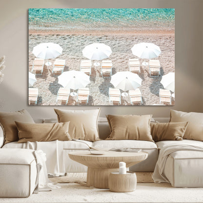 A bright beach scene with white umbrellas, pastel sand, and turquoise waters, creating a tranquil coastal vibe, perfect for beach house or summer decor.