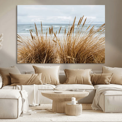 Canvas of golden beach grass swaying by the ocean under a soft cloudy sky, perfect for neutral-toned or coastal minimalist decor.