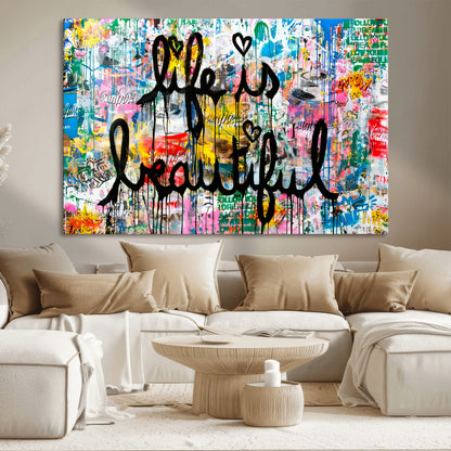 Colorful urban-style canvas with graffiti text “Life is Beautiful” in black paint, ideal for bold or street-themed home decor.