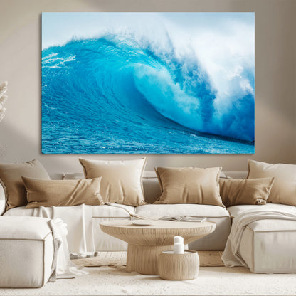 Vibrant canvas of a powerful curling ocean wave in tropical blue tones, perfect for coastal or surf-inspired decor settings.