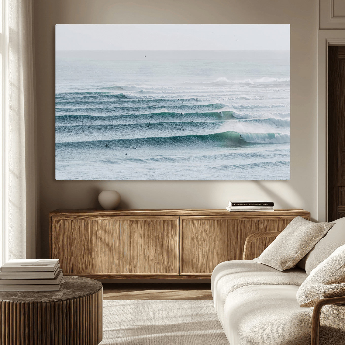 High-angle view of surfers lining up across layered ocean waves, ideal for minimal coastal or surf-inspired room decor.