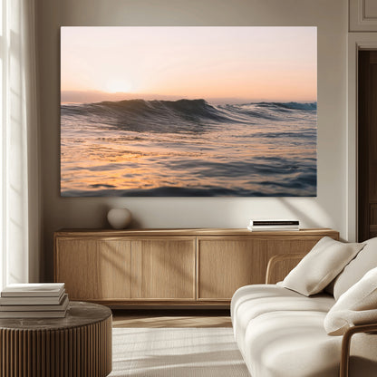Framed canvas of ocean waves glowing in sunset light, ideal for golden hour calm or peaceful coastal-inspired wall decor.