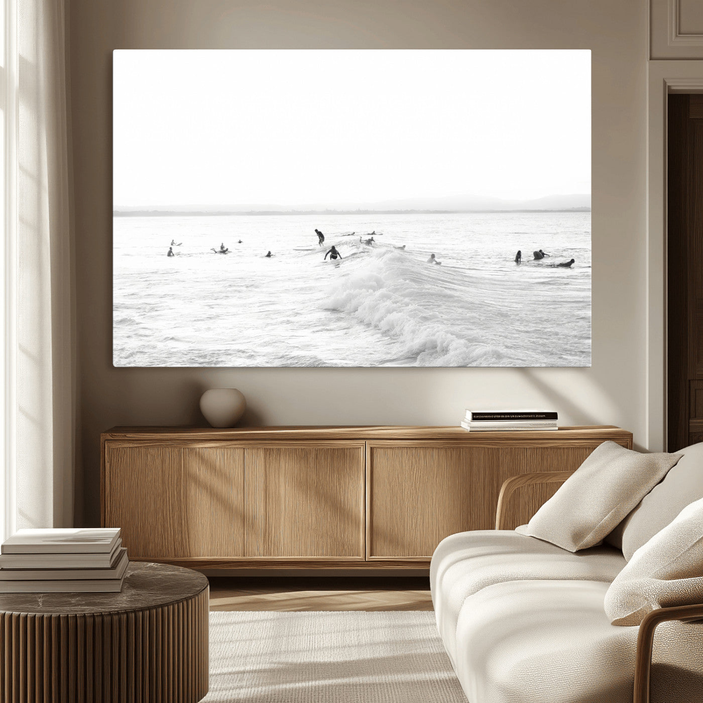 Monochrome photo of surfers riding and waiting on ocean waves, ideal for surf-themed or coastal energy wall decor.