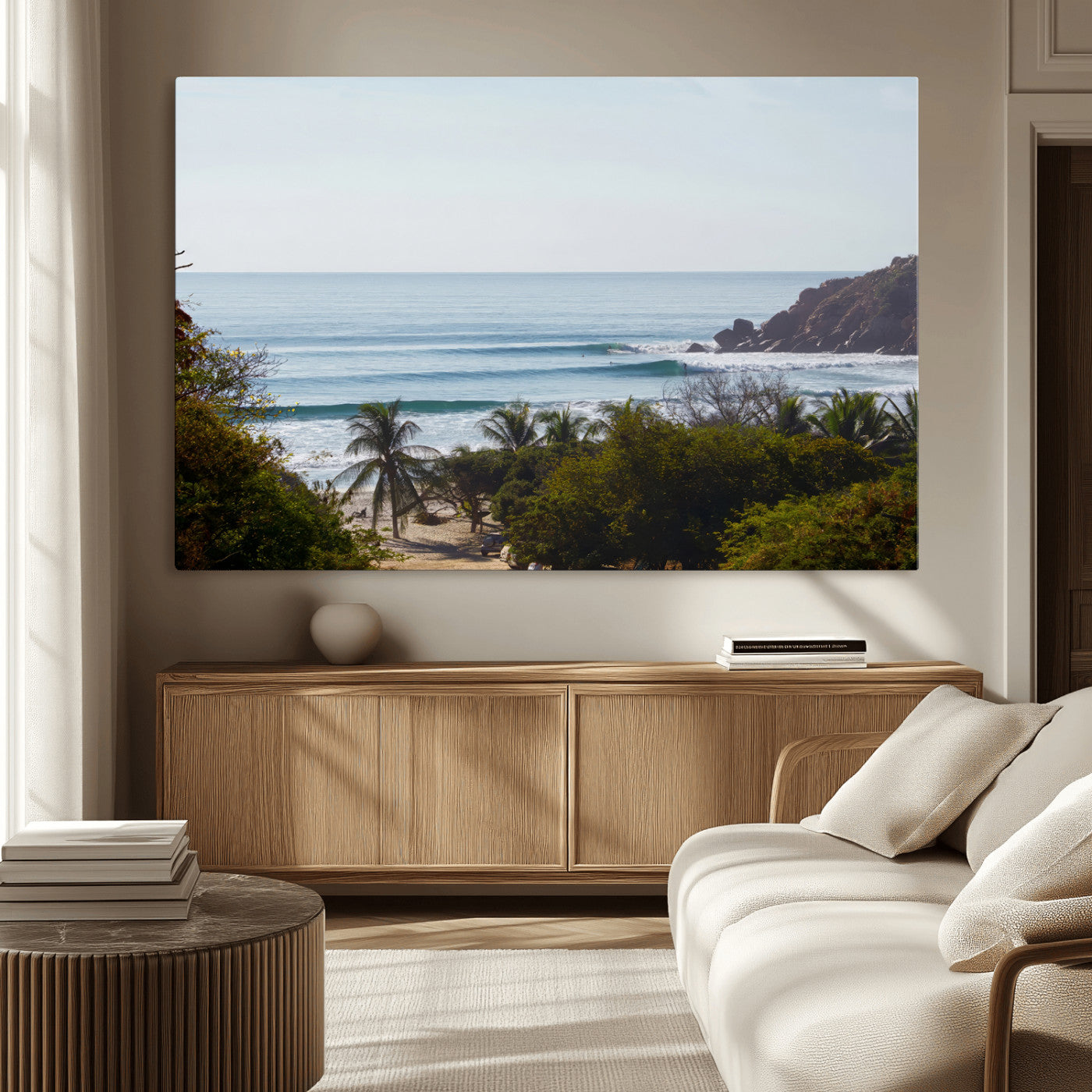 View of calm ocean waves with palm trees and a tropical coastline, ideal for coastal boho or beach-themed wall decor.