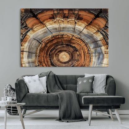 Canvas of tree rings and natural wood grain in earthy tones, ideal for rustic or vintage-inspired home decor with organic textures.