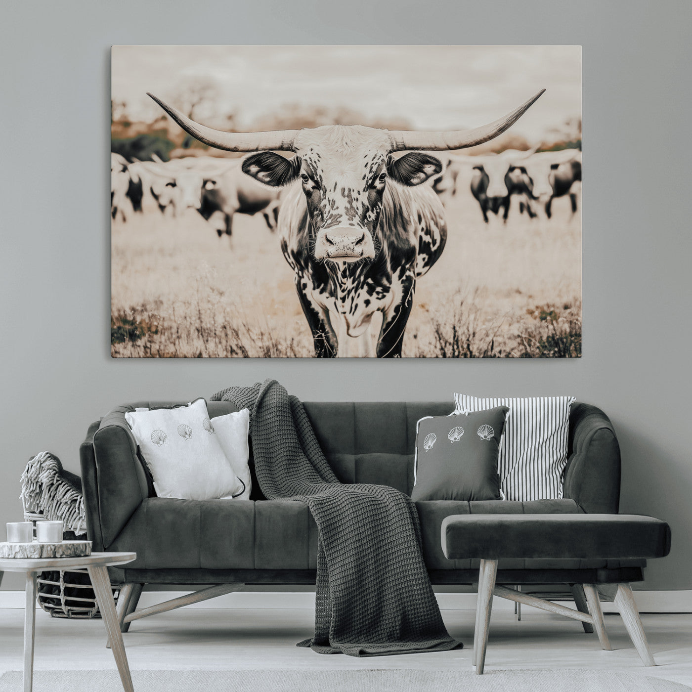 Canvas of a speckled Texas longhorn standing boldly in a field with a herd behind, perfect for rustic western or farmhouse wall decor.