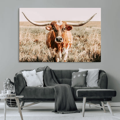 Framed longhorn cow canvas wall art with rustic prairie background, western animal print perfect for farmhouse or ranch style decor