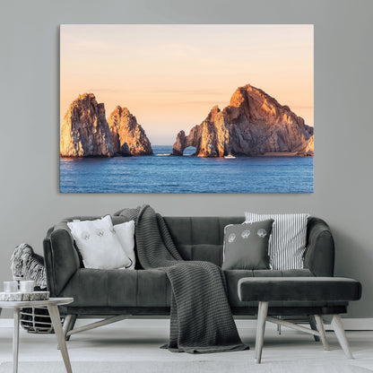 Framed canvas of El Arco rock formation in Cabo San Lucas at golden hour, ideal for coastal landmark or ocean-inspired decor.