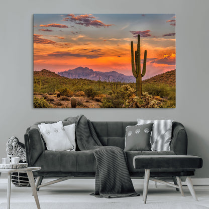 Vibrant desert sunset with saguaro cacti and distant mountains, perfect for Southwestern or warm-toned home decor.