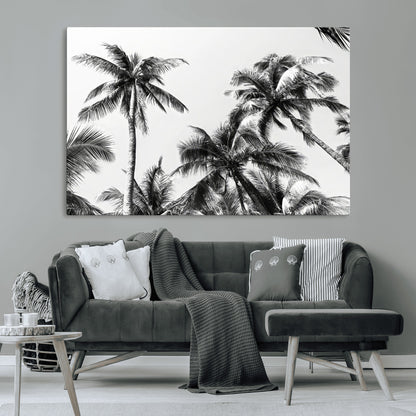 Black and white canvas of tall palm trees in moody tones, perfect for modern tropical minimalist or coastal-style home decor.