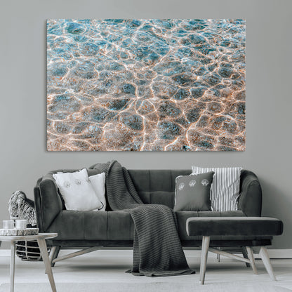 Close-up of sunlit ocean ripples with aqua blue and golden tones, ideal for modern coastal or minimalist home decor.