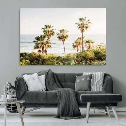 Framed print of sunlit palm trees on the California coast with warm tones, perfect for coastal minimalist or beach-style home decor.