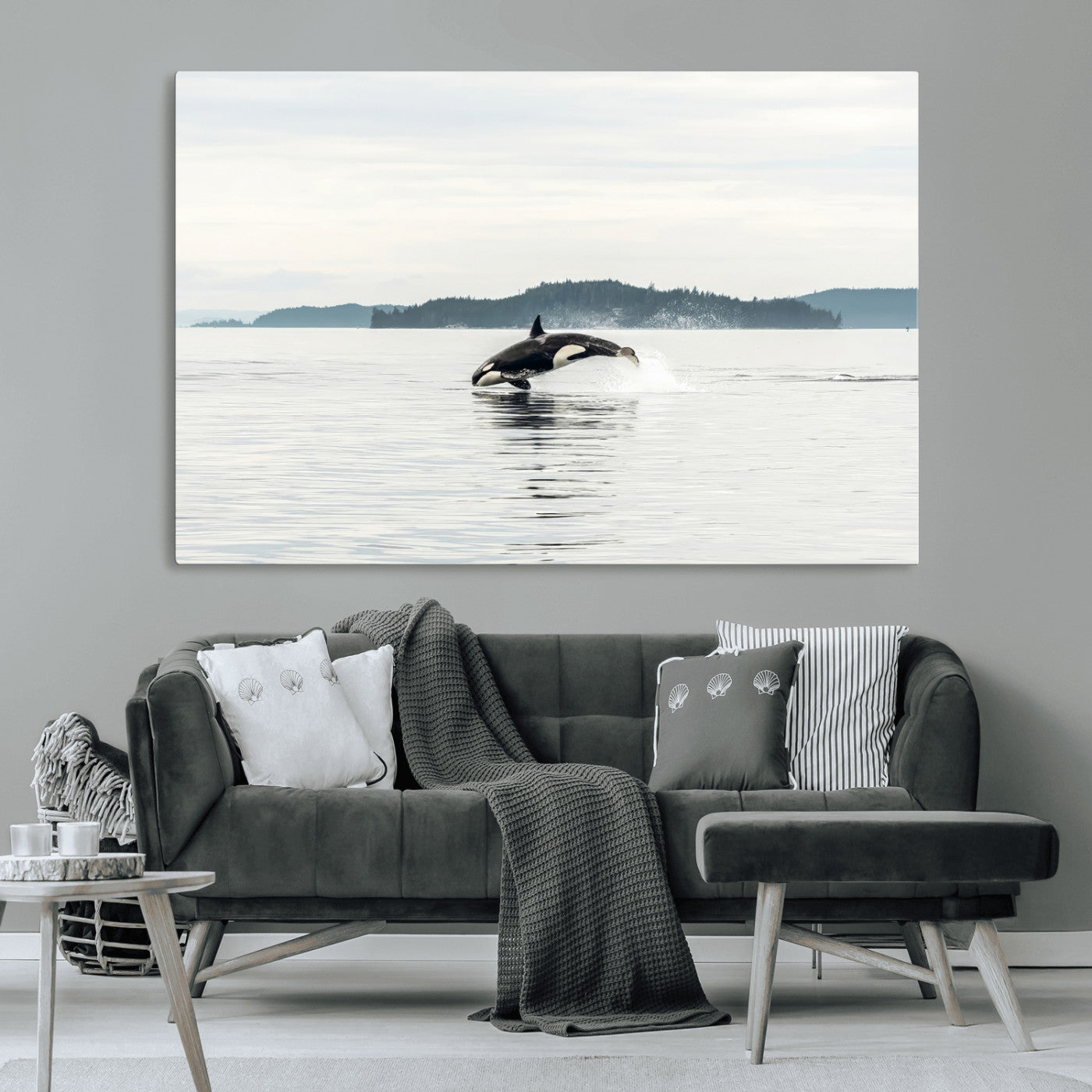 An orca jumping out of calm ocean waters with a misty island in the background, creating a serene and minimalist marine wildlife scene.