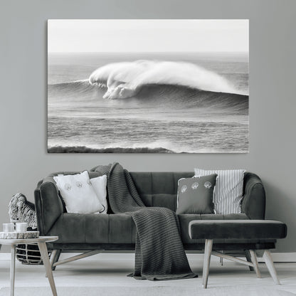 A dramatic black and white ocean wave crashing with immense force, capturing the raw power and movement of the sea in a bold seascape.