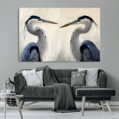 Two blue herons facing each other on a soft neutral background, ideal for coastal, tranquil, or nature-inspired minimalist interiors.