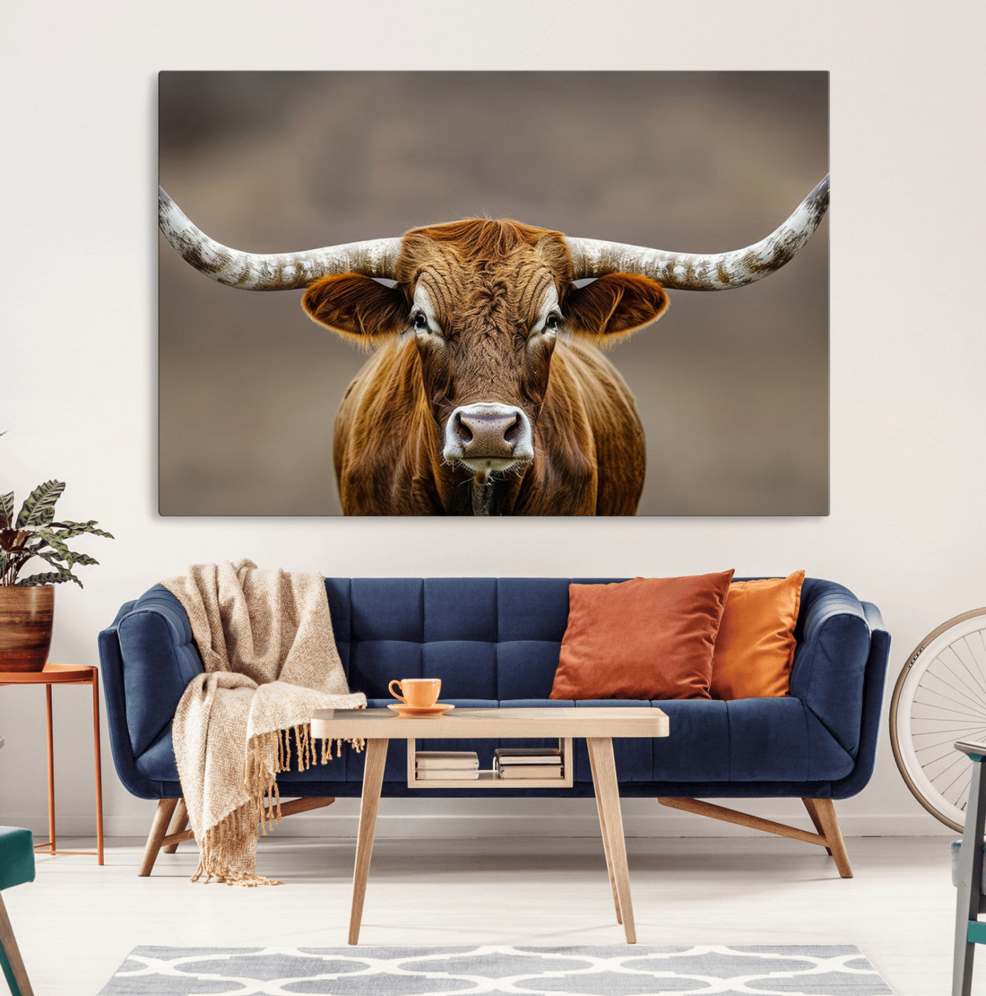 Close-up of a Texas Longhorn with strong curved horns and warm brown tones, perfect for rustic or western-style wall decor.
