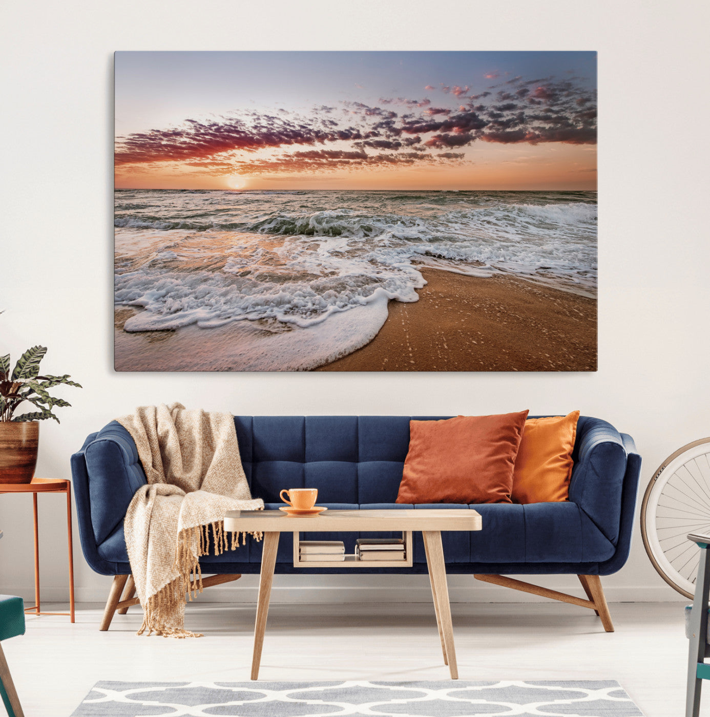 Canvas of a sunset over a foamy ocean shore with warm light and gentle waves, ideal for coastal or beach-themed home decor.