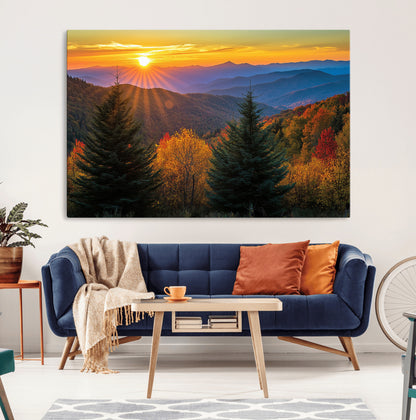 Vibrant sunset over autumn mountains with colorful trees and warm light, ideal for nature lovers or cabin-style wall decor.