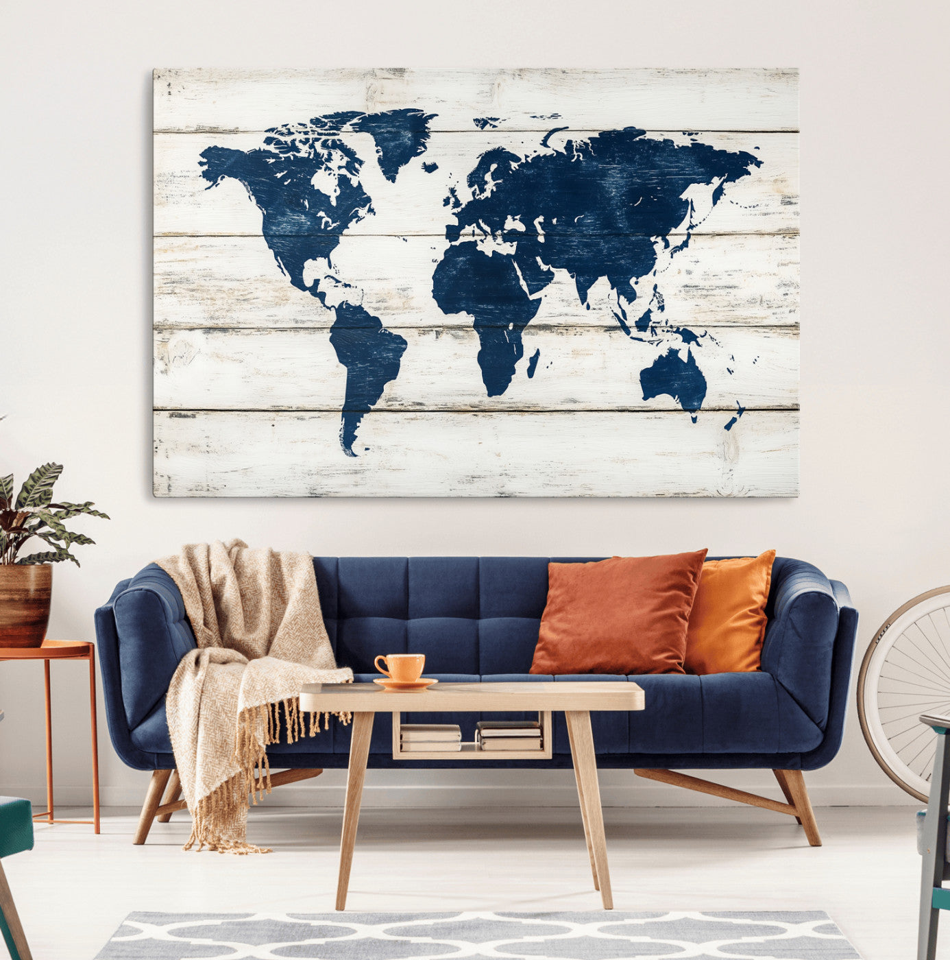 Rustic world map with dark blue continents on distressed wooden planks, perfect for coastal, explorer, or vintage-style wall decor.